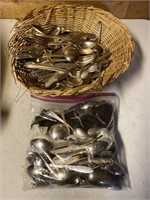 Basket of vintage and antique silverware