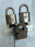 3 brass padlocks
