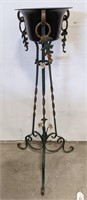 Ornate iron plant stand. Stands 41 inches tall.