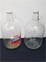 Two glass gallon jugs