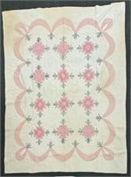 Hand crafted Quilt in pink dogwood pattern with