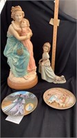 Two heartwarming statues, two collector plates