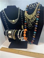 Lot of costume jewelry- necklaces, brackets,