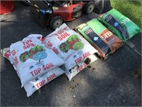 Six bags of topsoil, lawn food.