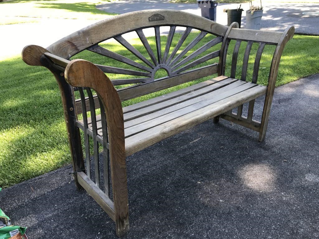 Outdoor wood and iron bench by Berkeley