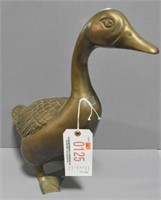 Heavy standing Brass goose. 18” T X 17” L X 7