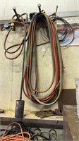 Lot of extension cords and air hose