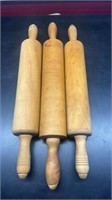 3 wood rolling pins, one stamped Munsing