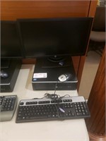 HP PC with mouse, keyboard, and monitor