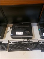 HP PC with mouse, keyboard, and monitor