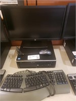 HP PC with mouse, keyboard, and monitor