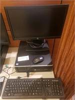 HP PC with mouse, keyboard, and monitor