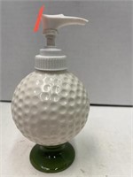 Golf ball on tee dispenser.