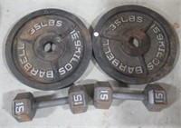 (2) 15 pounds dumbbells and (2) 35 pound barbell