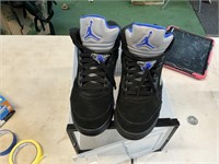 Blue and black Air Jordans, size 12, w/ plastic
