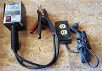 Battery Tester/ 
Extension Cord Outlet.