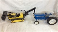 Toy Tonga backhoe and toy ford tractor