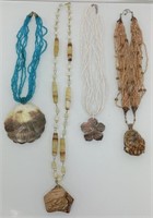 4 beautiful beaded necklaces with pendants