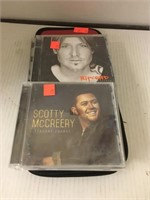 Lot of CDs and CD Case
Keith Urban, Scotty