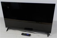 Roku TV with remote.
