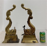 Pair brass dolphin motif andirons (missing tiny