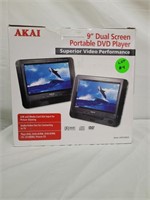 Dual Screen Portable DVD Player + Accessories