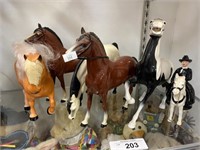 Six Horse Figurines.