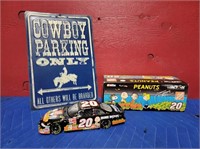 Cowboy Parking Tin Sign & Peanuts Die Cast Car