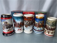 5 Budweiser collectible steins. Holiday