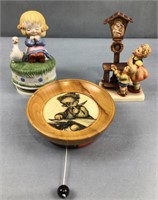 Hummel child figure with 2 non-Hummel music boxes