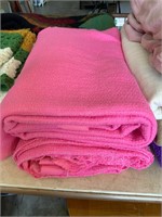 two pink twin blankets