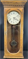 Howard Miller Oak Case Hanging Wall Clock