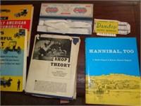 Items on Coffee Table:   Hannibal Too, Ford Books,