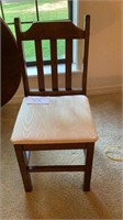 Solid 35” tall chair with cushion with little