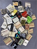 A Variety Of Vintage Match Books & Lighters