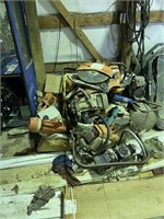 Pile of Industrial Scrap Hand Tools and bob cat