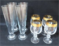 gold trim wine glasses and pilsner glasses