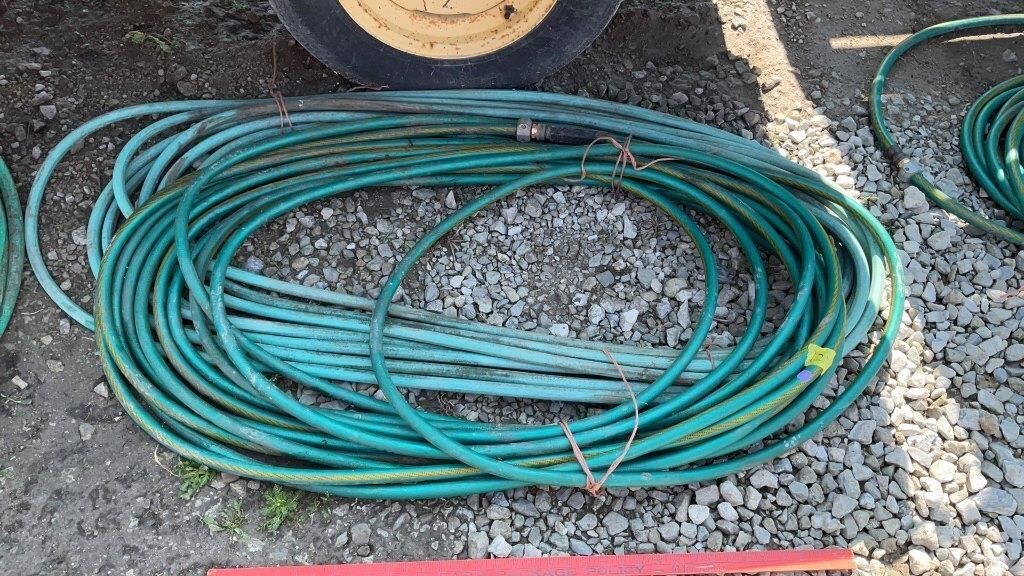 2- water hoses unknown length.