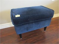 A Contemporary Upholstered Ottoman