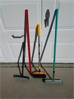 Snow broom and two glass squeegees