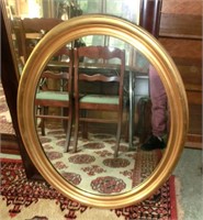 oval gold leaf wood framed mirror 25"x33"