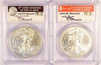 Pair Of Mercanti Signed Silver Eagles.