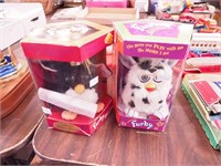 Two electronic Furbys in original packaging