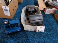 Box of polaroid cameras