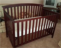 Baby and youth bed, dark wood with mattress