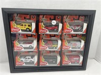 9 Matchbox Coca-Cola Vehicles in Boxes in a