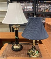 Two mismatched table lamps.