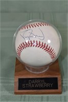 Darryl Strawberry autographed baseball in a case o