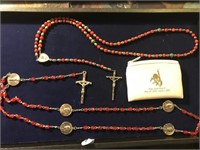 2 RED AND SILVER ROSARIES WITH POUCH