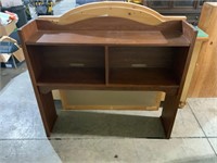 wooden cabinet (top of desk?)